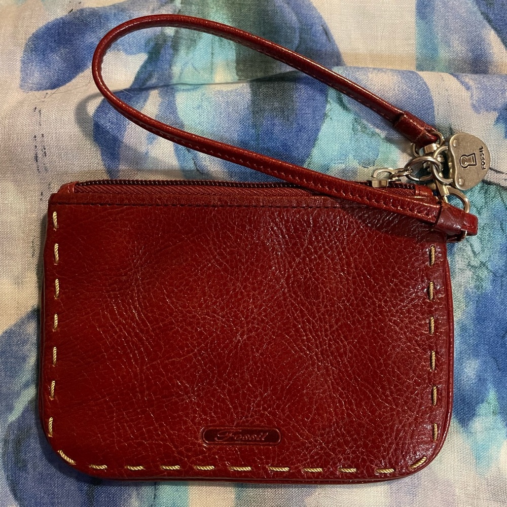 Fossil deep red wristlet with added charm EUC